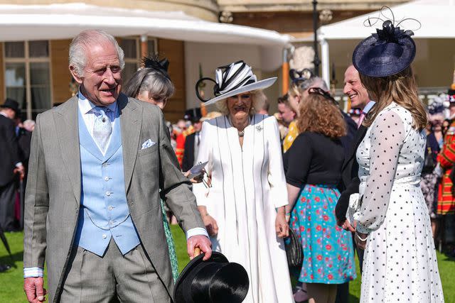<p>Jordan Pettitt-PA/POOL supplied by Splash News/SplashNews</p> King Charles and Queen Camilla at the Buckingham Palace garden party