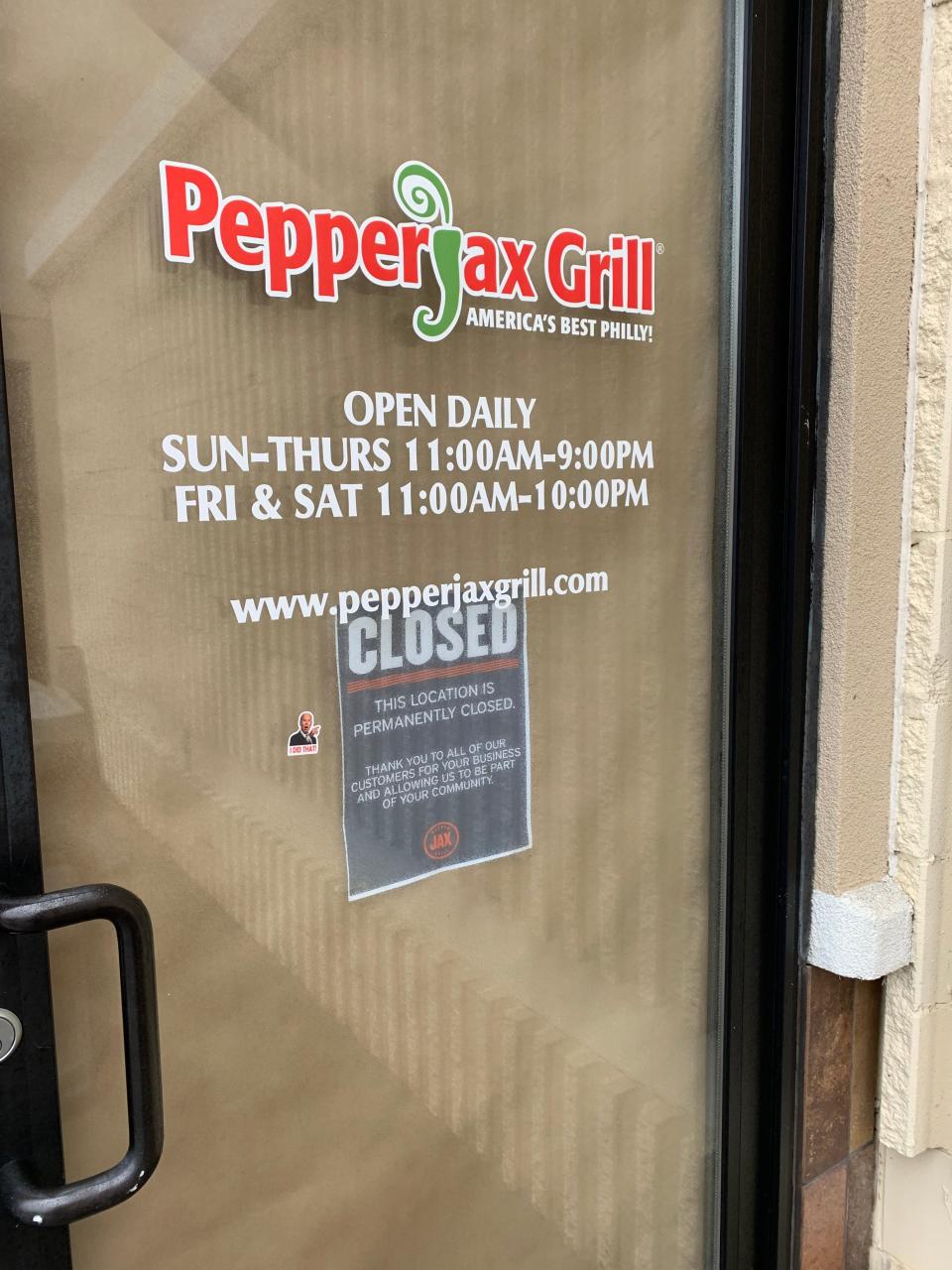 A sign on Pepperjax Grill at 3219 Division St. pictured Friday, April 22, 2022, announces the location's closure.