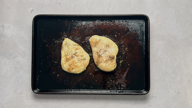 baked chicken on sheet tray