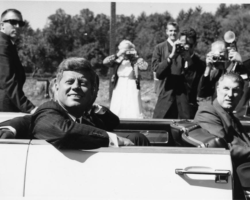 After touring the Grey Towers mansion, boyhood home of Gifford Pinchot, President John F. Kennedy arrived by motorcade past adoring crowds to the speaker's stage.