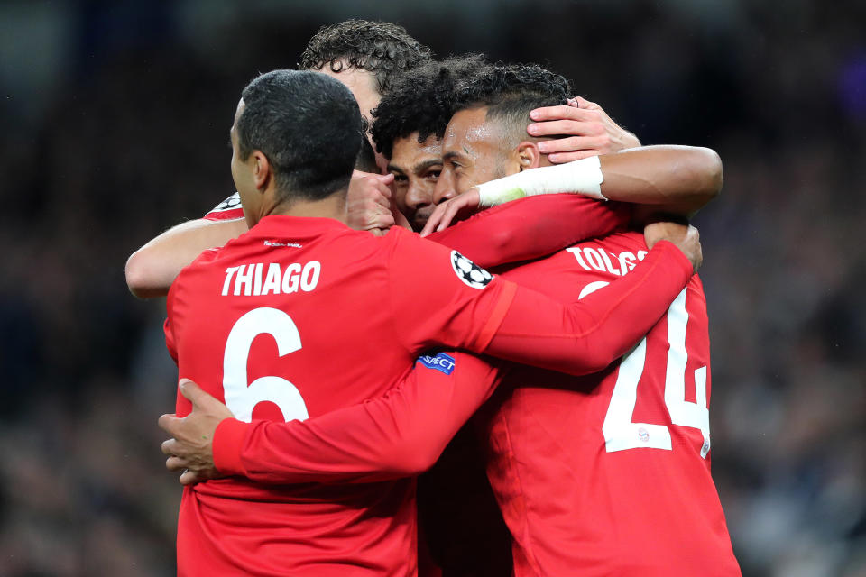 LONDON, ENGLAND - OCTOBER 01: Serge Gnabry of Bayern peeks out from between the faces of his teammates as they celebrates him scoring their 4th goal during the UEFA Champions League group B match between Tottenham Hotspur and Bayern Muenchen at Tottenham Hotspur Stadium on October 1, 2019 in London, United Kingdom. (Photo by Charlotte Wilson/Offside/Offside via Getty Images)