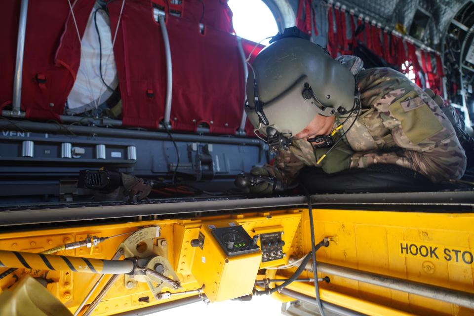 Two Hawaii Army National Guard CH47 Chinook perform aerial water bucket drops on the Island of Maui to assist the fight of wildfires, Maui, Hawaii, August 09, 2023. The two air crews performed 58 total bucket drops in 5 hours in up country Maui totaling over one hundred thousand gallons dropped on the fires. (U.S. National Guard Video by Air Force Master Sgt. Andrew Jackson)