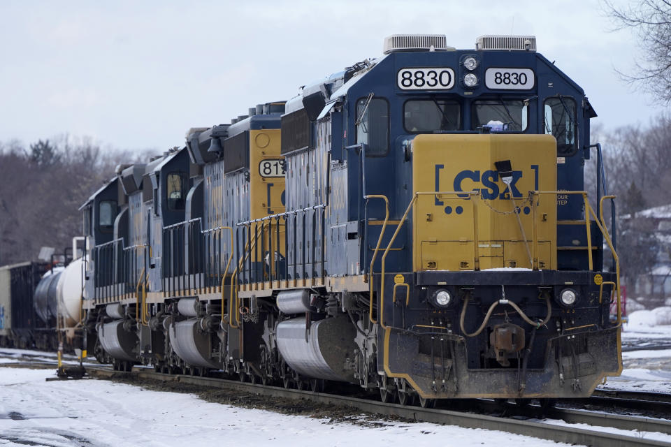 CSX locomotives rest together on tracks at CSX North Framingham Yard, Tuesday, Jan. 24, 2023, in Framingham, Mass. CSX railroad will release its fourth-quarter earnings report Wednesday afternoon and tell investors about what it expects in 2023. (AP Photo/Steven Senne)