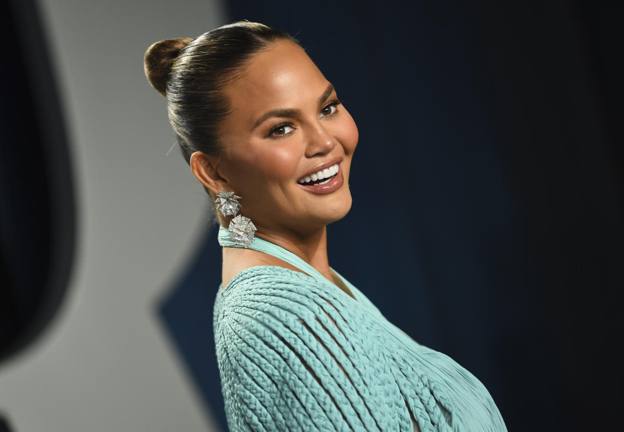 Chrissy Teigen arrives at the Vanity Fair Oscar Party on Sunday, Feb. 9, 2020, in Beverly Hills, Calif. (Photo by Evan Agostini/Invision/AP)