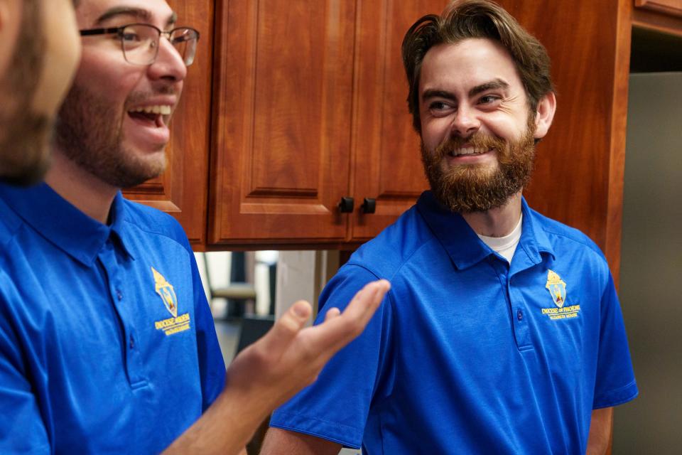 Seminary students, Jose Muñoz (left) and Bobby Balser visit with each other as they take a break from class at Our Lady of Perpetual Help House on Sept. 29, 2023, in Scottsdale.