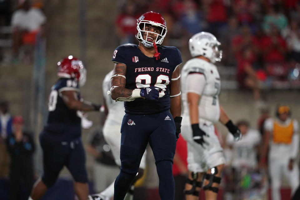 Sept. 24, 2021; Fresno, California; Fresno State Bulldogs defensive end David Perales (99) reacts after the Bulldogs made a defensive stop on third down against the UNLV Rebels in the second quarter at Bulldog Stadium. Cary Edmondson-USA TODAY Sports