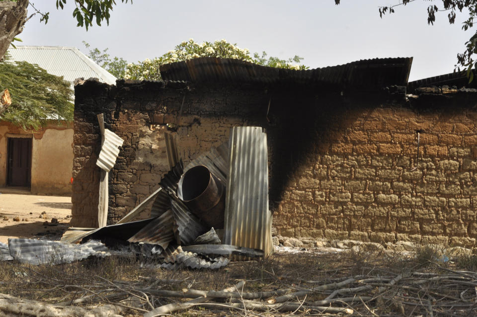 A burnt out house is seen following an attacked by gunmen in north central Nigeria, Tuesday, Dec. 26, 2023. Nigerian officials and survivors say at least 140 people were killed by gunmen who attacked remote villages in north-central Nigeria's Plateau state in the latest of such mass killings this year blamed on the West African nation's farmer-herder crisis. (AP Photo)