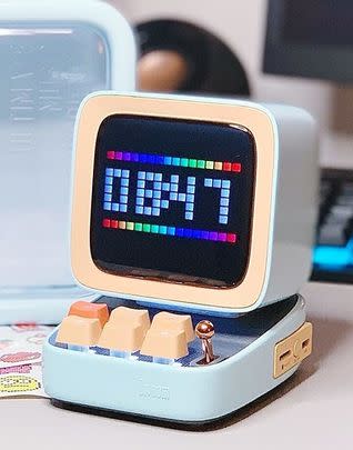 A cute Bluetooth speaker with a retro computer design, including real RGB-backlit buttons
