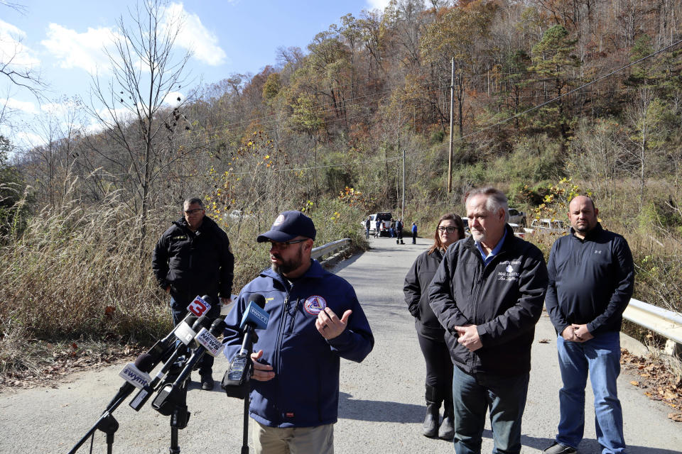 Director of Kentucky Emergency Management Col. Jeremy Slinker addresses reporters outside a road leading to the abandoned Martin Mine Prep Plant in Inez, K.Y. where the collapse of an 11-story building killed at least one man on Wednesday, Nov. 1, 2023. (AP Photo/Leah Willingham)