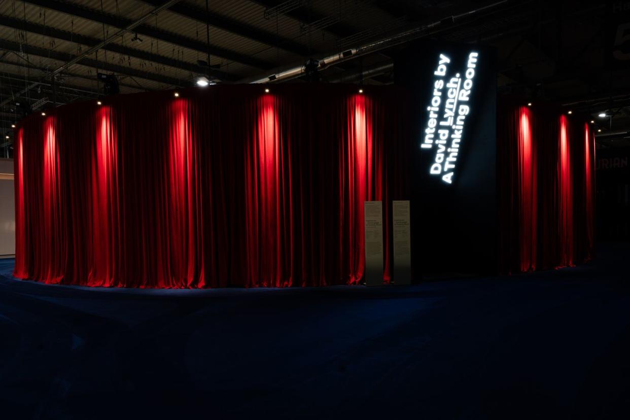 a stage with red curtains