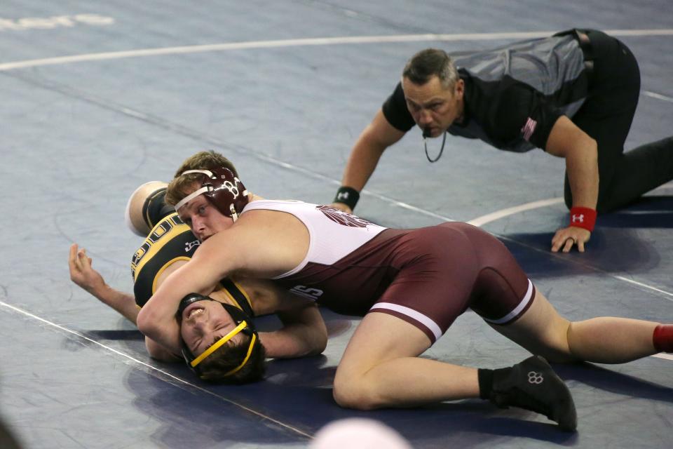 Jason Osgood of Blackwell, top, wrestles Kaden Murrayof Jay in a Class 3A 175-pound semifinal match during the Oklahoma state wrestling tournament at State Fair Arena in Oklahoma City, Friday, Feb. 24, 2023. 