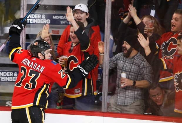 Calgary Sports and Entertainment says it will require all fans, event staff, and employees to be fully vaccinated for attendance at live events at McMahon Stadium and the Saddledome.  (Larry MacDougal/The Canadian Press - image credit)