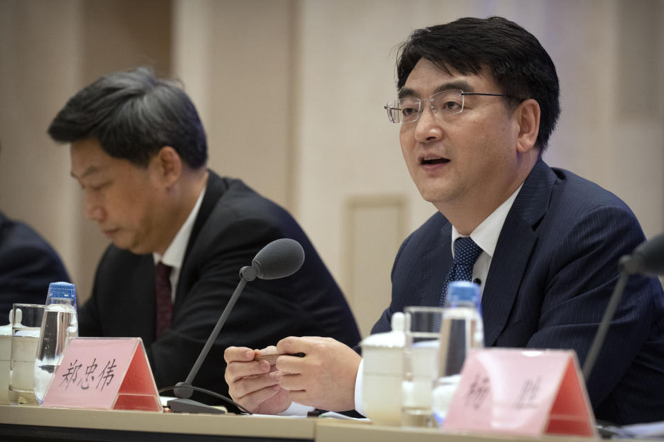 Zheng Zhongwei, an official with China's National Health Commission, speaks during a press conference held to discuss COVID-19 vaccine-related issues at the State Council Information Office in Beijing, Friday, Sept. 25, 2020. A Chinese health official said Friday that the country's annual production capacity for COVID-19 vaccines will top 1-billion next year, following an aggressive government support program for new factories. (AP Photo/Mark Schiefelbein)