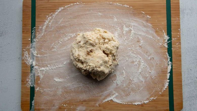 dough ball on floured surface