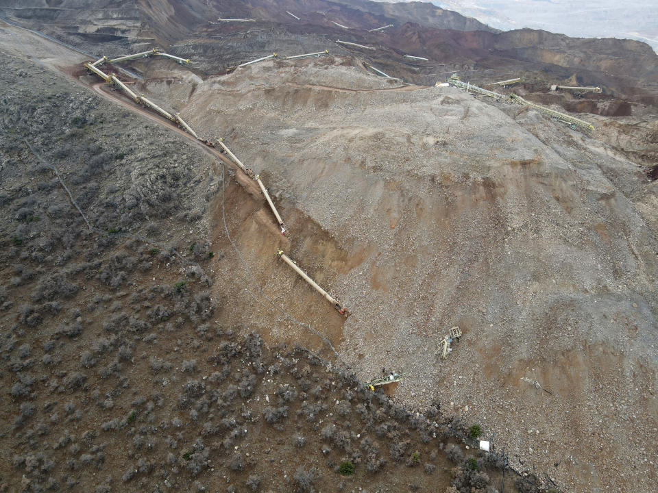 A view of the landslide at the Copler gold mine near Ilic village, eastern Turkey, Wednesday, Feb. 14, 2024. Hundreds of rescuers on Wednesday pressed ahead with efforts to search for at least nine workers trapped at a gold mine in eastern Turkey that was engulfed by a massive landslide. (Ugur Yildirim/Dia images via AP)