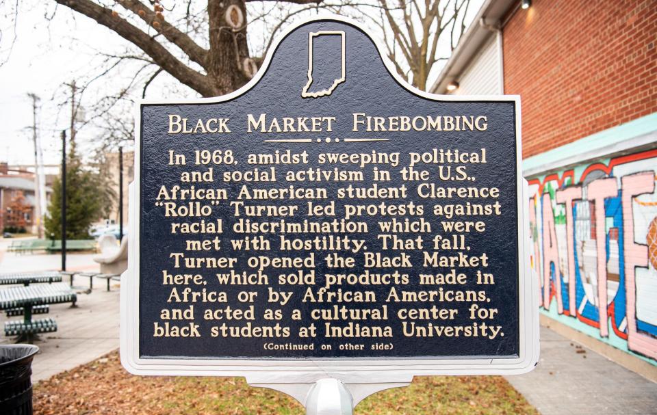 A sign recognizing the Black Market firebombing at People's Park on Tuesday, Jan. 31, 2023.