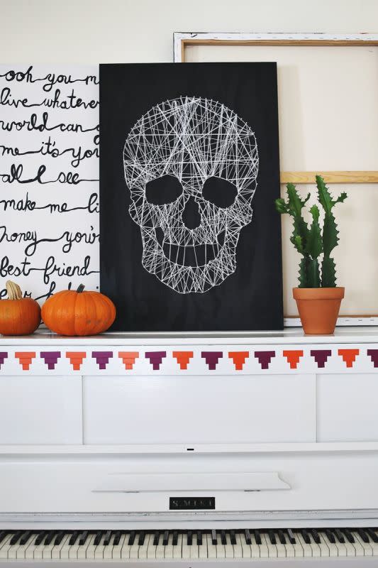 <p>A Beautiful Mess</p><p>After you create this stunning piece of art from <a href="https://abeautifulmess.com/make-your-own-skull-string-art/" rel="nofollow noopener" target="_blank" data-ylk="slk:A Beautiful Mess;elm:context_link;itc:0;sec:content-canvas" class="link ">A Beautiful Mess</a>, you’re going to want to keep it up all year long!</p>