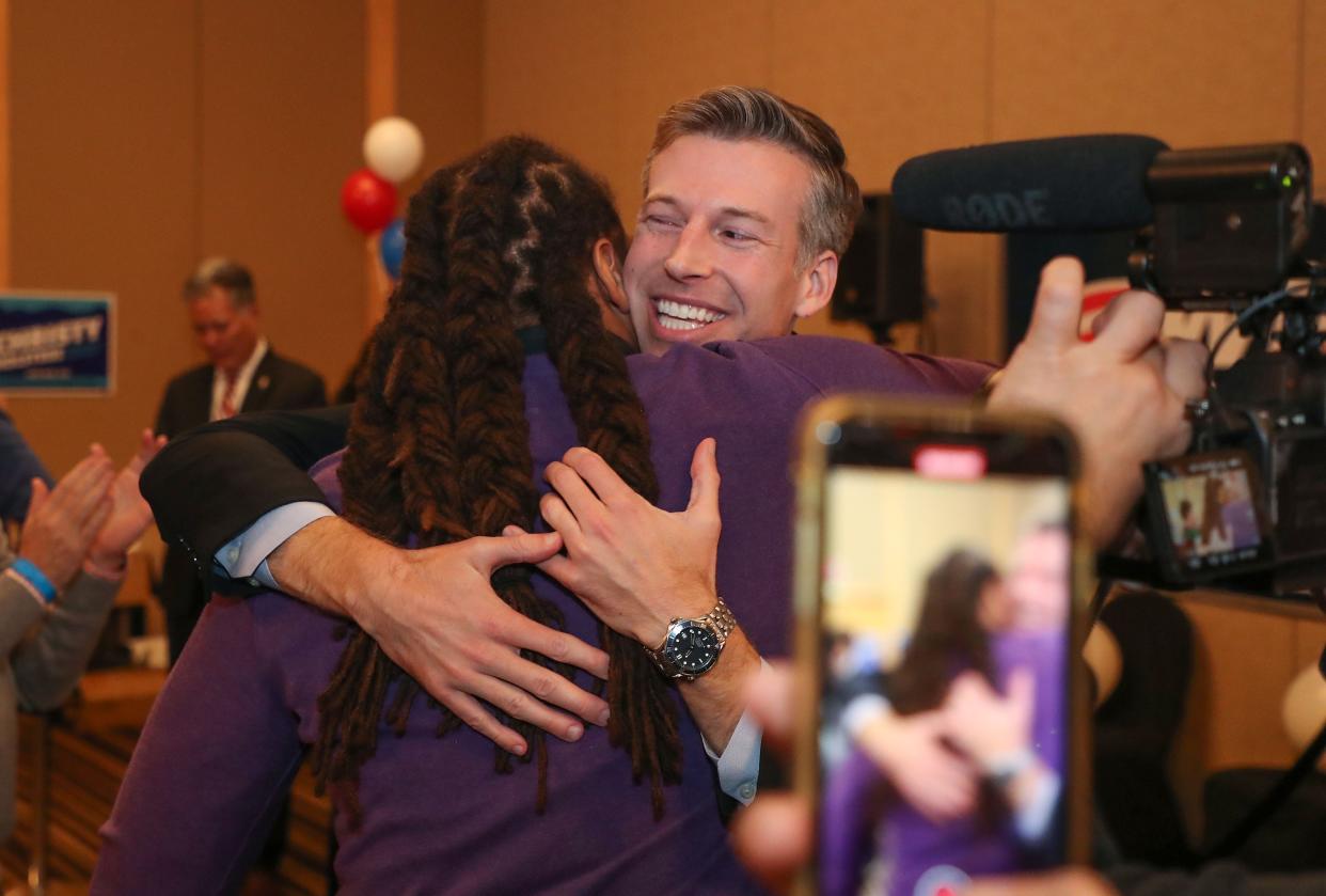 Will Rollins hugs a supporter during his election night party at Hotel Zoso in Palm Springs on Tuesday.