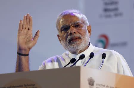 Indian Prime Minister Narendra Modi gestures while addressing the gathering during the launch of "Digital India Week" in New Delhi, India, July 1, 2015. REUTERS/Adnan Abidi