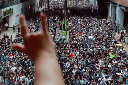 Anti-extradition bill protesters march at Sha Tin District of East New Territories, Hong Kong