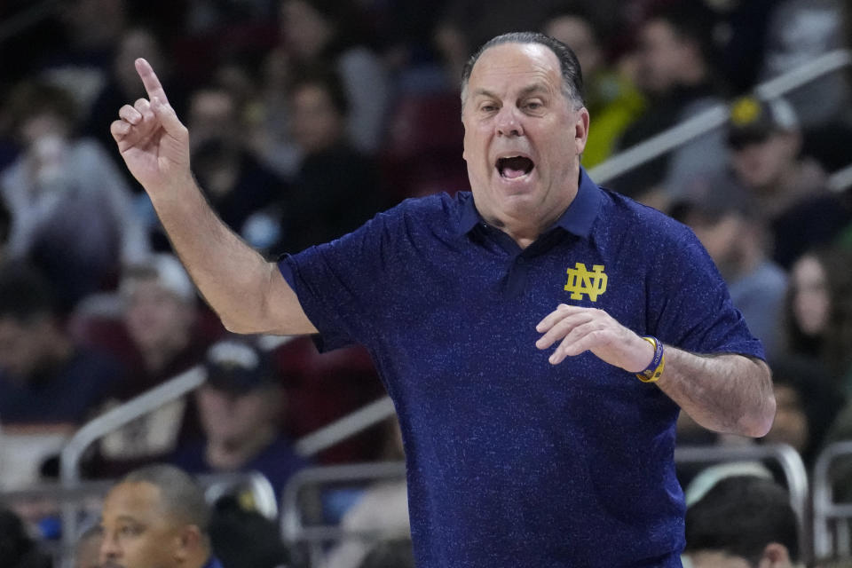 Notre Dame head coach Mike Brey calls to his players during the first half of an NCAA college basketball game against Boston College, Tuesday, Jan. 3, 2023, in Boston. (AP Photo/Charles Krupa)