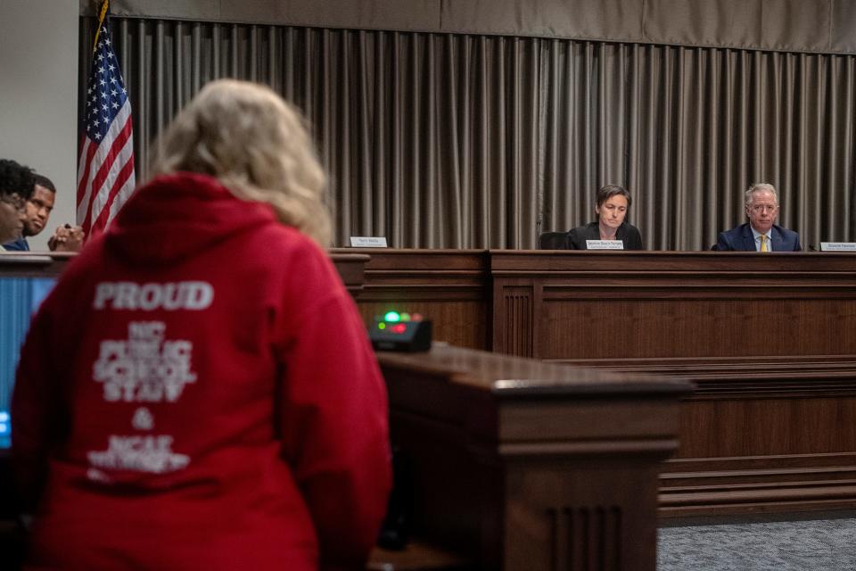 Joan Hoffman, a Buncombe County educator of 20 years and current teacher at AC Reynolds High School, speaks to the Buncombe County Commission about teacher pay June 20, 2023.