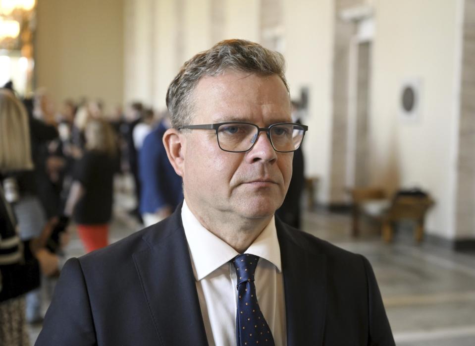 Finnish Prime Minister Petteri Orpo meets the media after his government's non-confidence vote at the Parliament of Finland in Helsinki on Friday, Sept. 8, 2023. (Vesa Moilanen/Lehtikuva via AP)