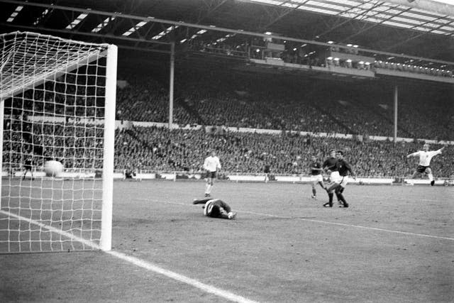 Charlton (far right) fires in the second of his two goals in the semi-final victory over Portugal