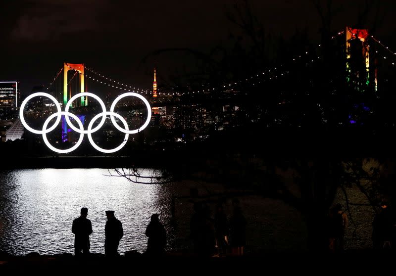 The giant Olympic rings are illuminated after being reinstalled at Odaiba Marine Park, amid the coronavirus disease (COVID 19) outbreak, in Tokyo