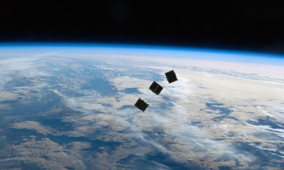 Nanosatellites in space.