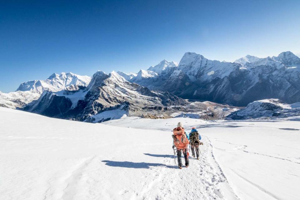 <p>Getty</p> Climbers trekking across Mount Everest