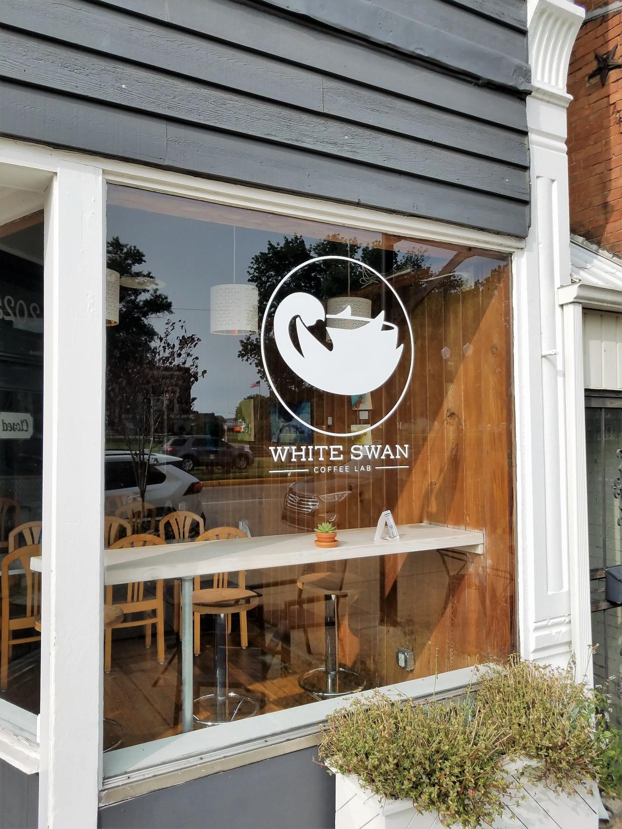 White Swan Coffee Lab on West Franklin Street announced it is closing due to "overwhelming" increases in operations costs.