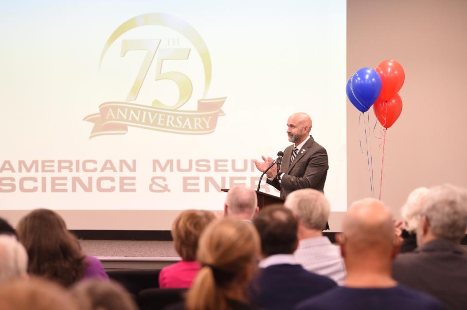 Mayor Pro Tem Jim Dodson speaks at the American Museum of Science & Energy’s 75th Anniversary celebration at AMSE in Oak Ridge, Tenn., Tuesday, March 19, 2024.Dodson is also on the AMSE board. He read a proclamation from the city making March officially AMSE Month in the city.