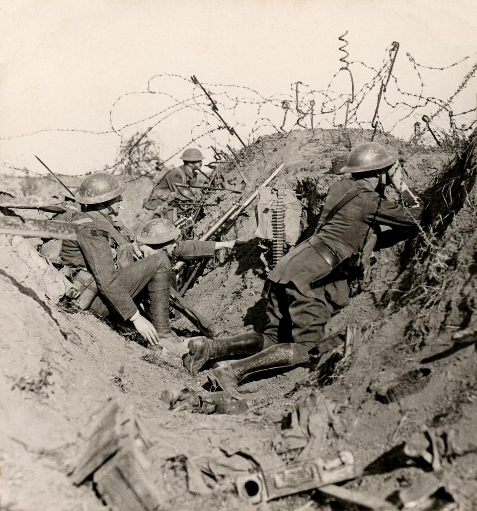 The Great War Realistic Travels Military photographs circa 1918. Ready for the great Somme push, officer and signalers keep sharp look out over Sausage valley.