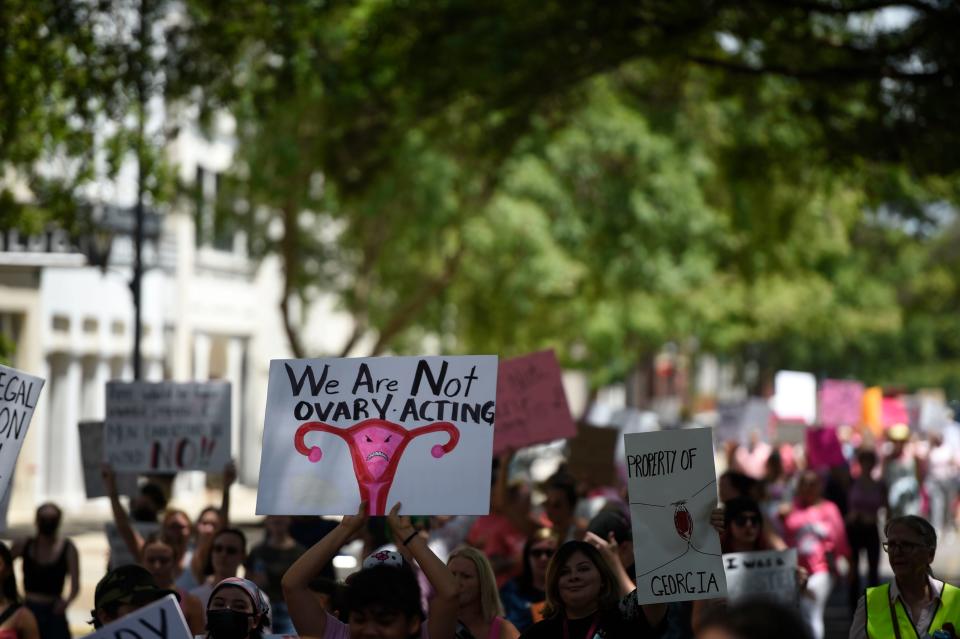 FILE - Around 400 protesters joined the march down Broad Street in Augusta on July 2 to protest for women's rights. A similar march is being held along Telfair Street on Saturday, Oct. 22.