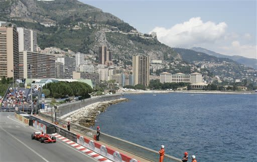 Formula One driver Kimi Raikkonen of Finland steers his Ferrari during free practice at the Monaco Formula One Grand Prix circuit, in Monaco, Thursday, May 22, 2008. Qualifying is on Saturday, and Sunday's race is 78 laps. (AP Photo/Luca Bruno)