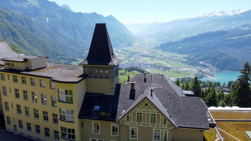 General view shows the Rehazentrum Walenstadtberg rehabilitation clinic and Lake Walensee in Walenstadtberg