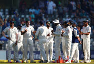 Cricket - India v England - Fourth Test cricket match - Wankhede Stadium, Mumbai, India - 12/12/16. India's players celebrate the wicket of England's Jonny Bairstow. REUTERS/Danish Siddiqui