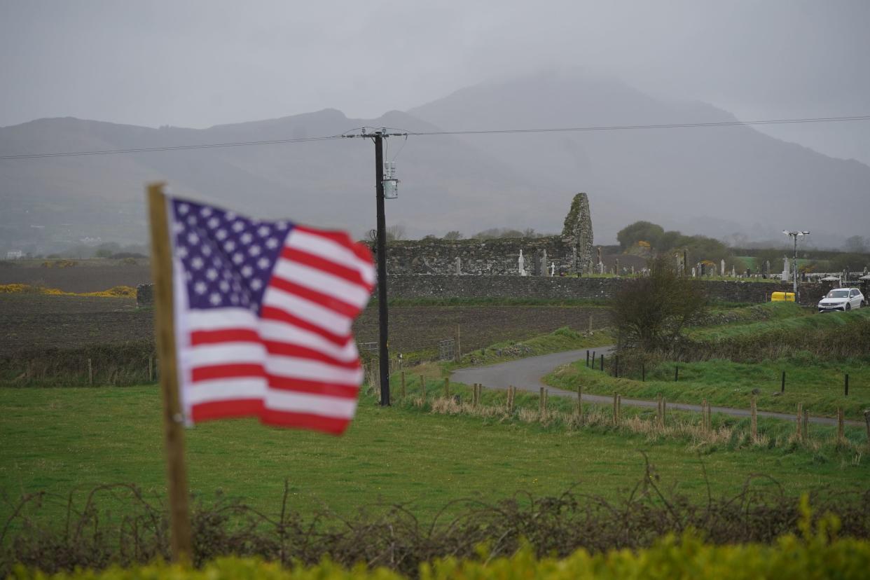 A Stars and Stripes flag flies close to Kilwirra cemetery and church ruins, where Biden’s relatives are buried (PA)