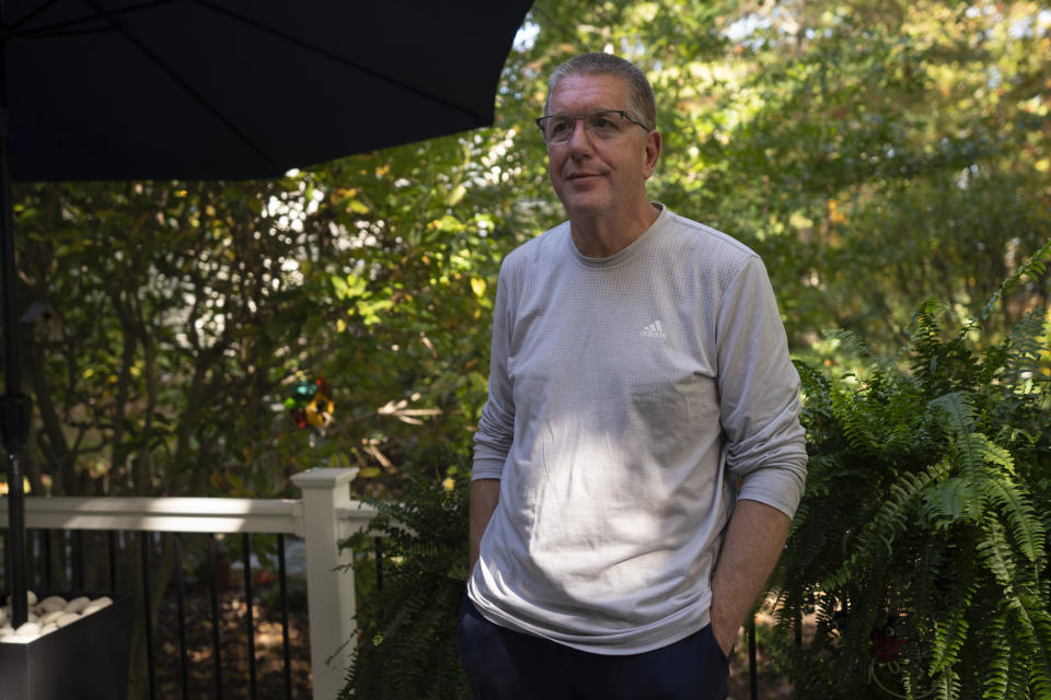 Tom Eichenberg, retired school administrator, poses for a portrait at his home in Fredericksburg, Va., Oct. 26, 2023. (AP Photo/Serkan Gurbuz)