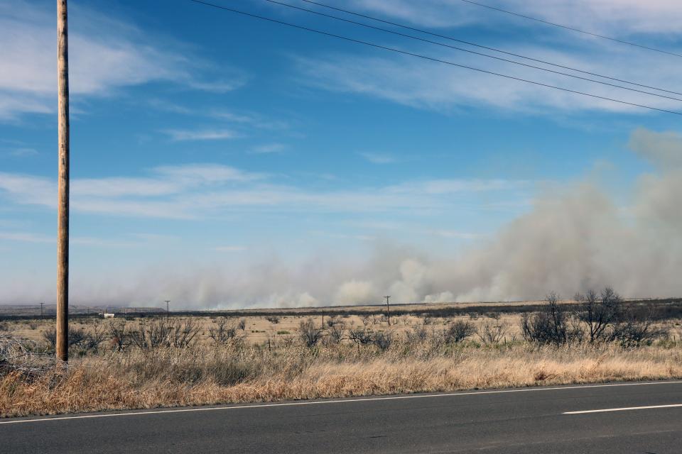 The south line of the Windy Duece fire just south of Lake Meredith near Fritch, Texas, can be seen from Highway 136 as the fire burns more than 8,000 acres as of Tuesday afternoon.