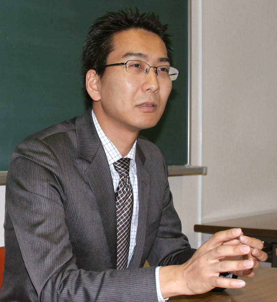 Yuki Kitazumi speaks during an interview in Fukuoka, southwestern Japan, on April 1, 2013. Japan's government said Monday, April 19, 2021 it is asking Myanmar to release Kitazumi, a former Nikkei business newspaper reporter currently based in Yangon as a freelance journalist, who was arrested by security forces in its largest city of Yangon the previous day. (Kyodo News via AP)