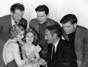 <p>Fox wasted no time in capitalizing on Shirley's adorable demeanor. By the end of 1934, she'd starred in seven major pictures, including <em>Bright Eyes</em>. Here, Shirley is seen with her adult costars in <em>Little Miss Marker, </em>Dorothy Dell, Charles Bickford, and Adolphe Menjou.</p>
