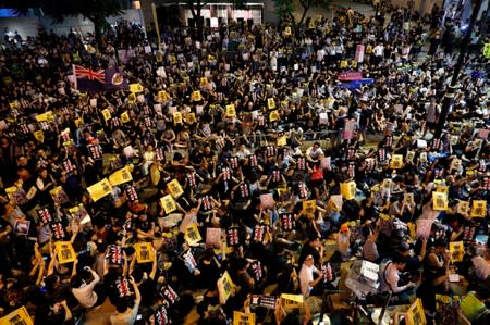 Anti-extradition bill protesters attend a rally calling on the British and U.S. governments to monitor the implementation of "one country two systems" principal, in Hong Kong