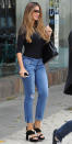 <p>The Colombian star stepped out in a pair of ripped and cuffed jeans, black platform sandals with gold accents (shop a similar style <a rel="nofollow noopener" href="https://www.shopbop.com/mara-platform-sandal-sam-edelman/vp/v=1/1504209869.htm" target="_blank" data-ylk="slk:here;elm:context_link;itc:0;sec:content-canvas" class="link ">here</a>), a long-sleeved black tee, and a quilted purse. </p>