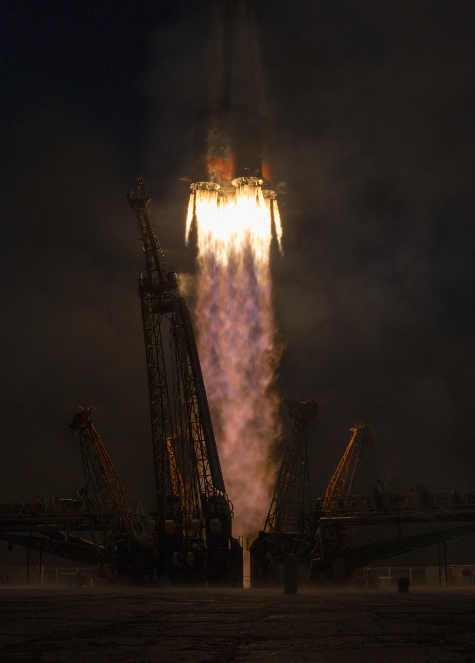 In this photo provided by NASA the Soyuz-FG rocket booster with Soyuz MS-11 space ship carrying a new crew to the International Space Station, ISS, launches from at the Russian leased Baikonur cosmodrome, Kazakhstan, Monday, Dec. 3, 2018. The Russian rocket carries U.S. astronaut Anne McClain, Russian cosmonaut Oleg Kononenko, and CSA astronaut David Saint Jacques. (Aubrey Gemignani/NASA via AP)