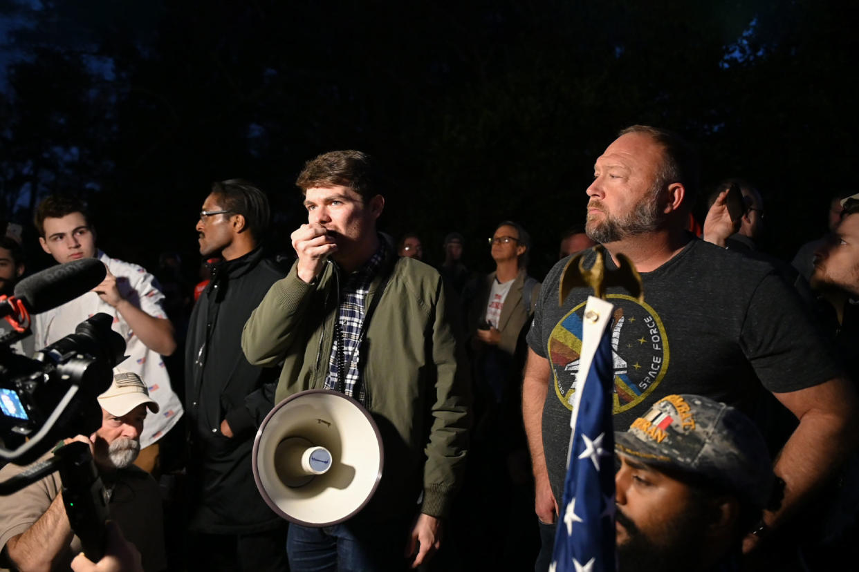 Nick Fuentes, Alex Jones and Ali Alexander Zach Roberts/NurPhoto via Getty Images