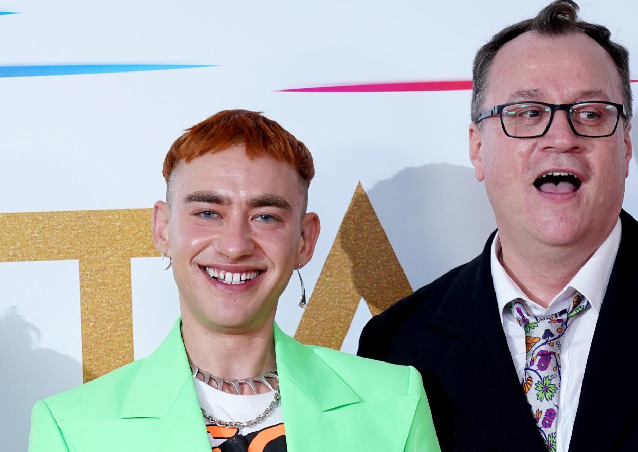 Olly Alexander and Russell T Davies were shocked to win the New Drama award for 'It's A Sin' at the National Television Awards. (PA)