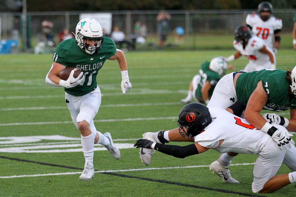 Sheldon running back Grafton Robinson turns upfield and looks for more yardage during a football game against Sprague on Sept. 16.