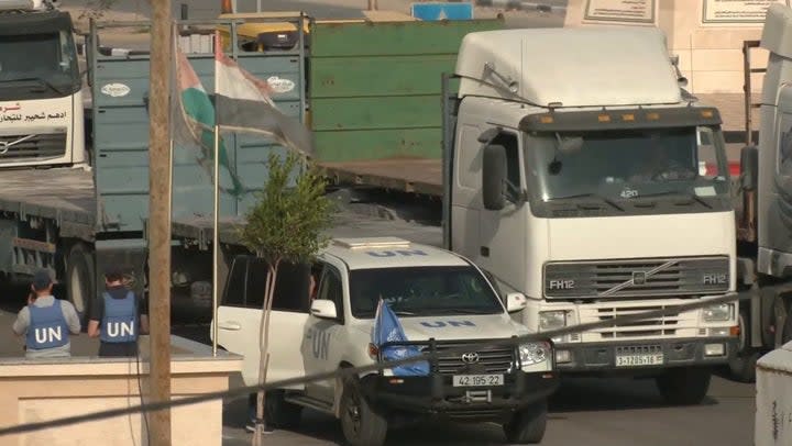 Humanitarian aid trucks at the Egypt-Gaza border (Reuters)